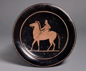 Attic red-figure plate showing a mounted archer in oriental costume, inscribed Miltiades kalos, 520-510 BC